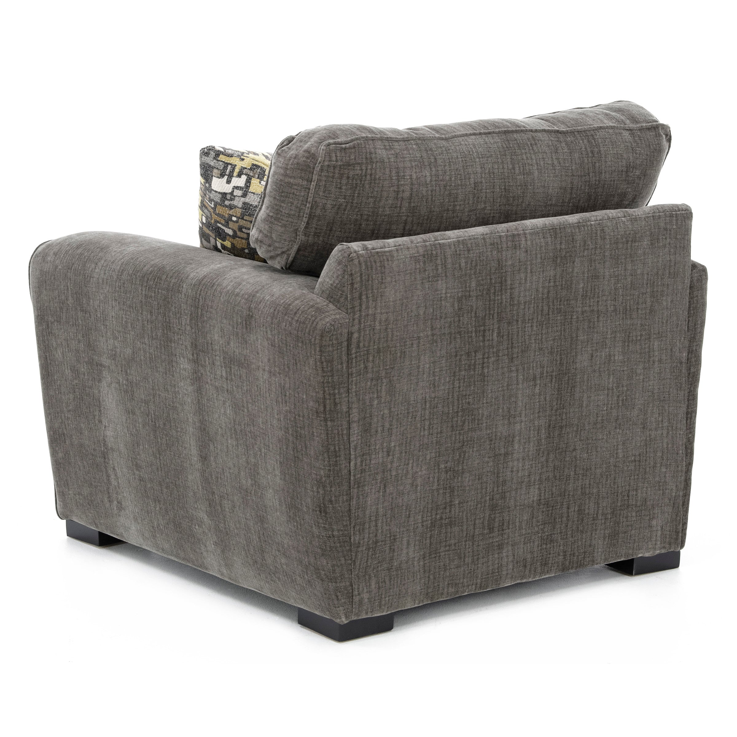 Back and side view of a gray fabric armchair with a patterned cushion.