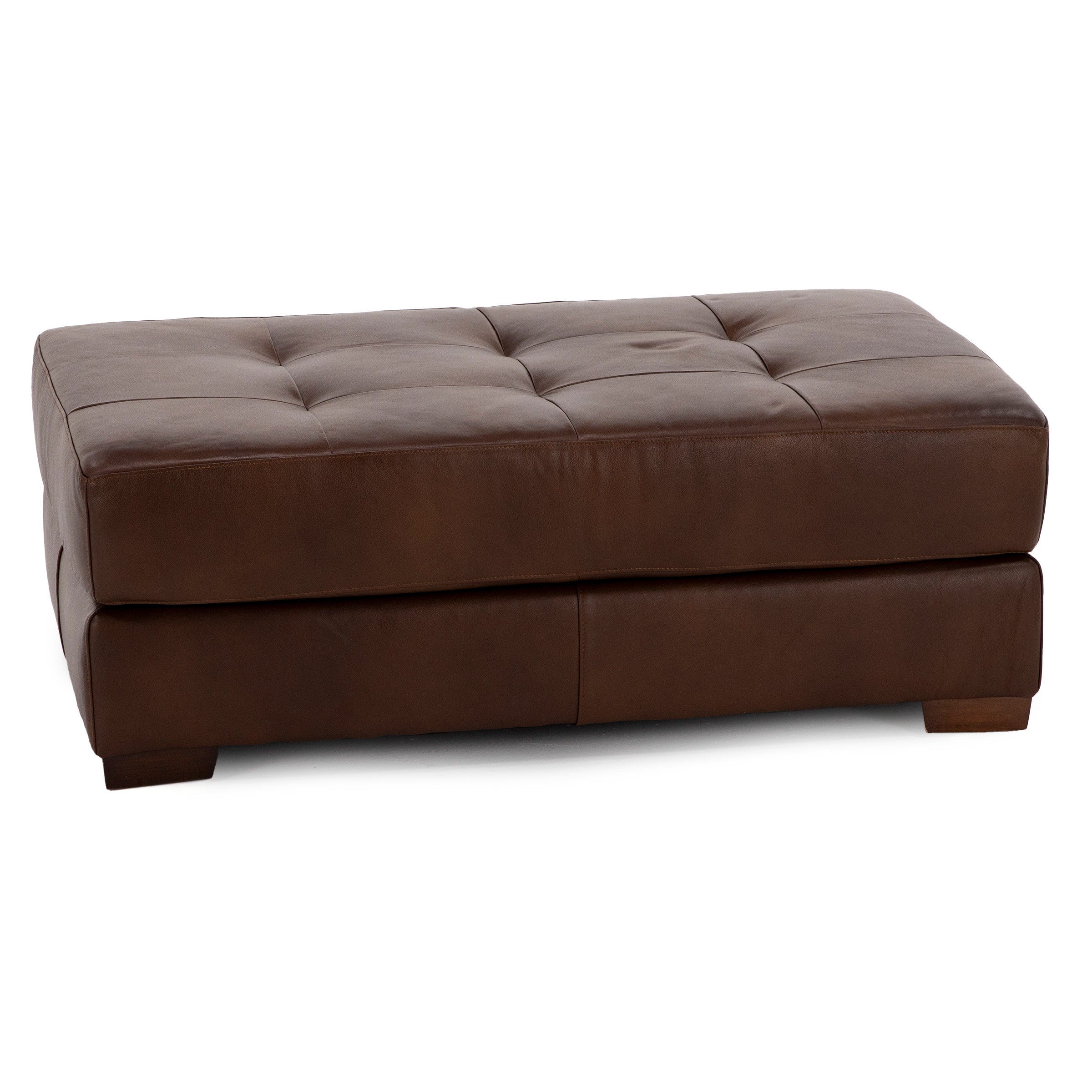 Brown leather ottoman with tufted top and wood feet.