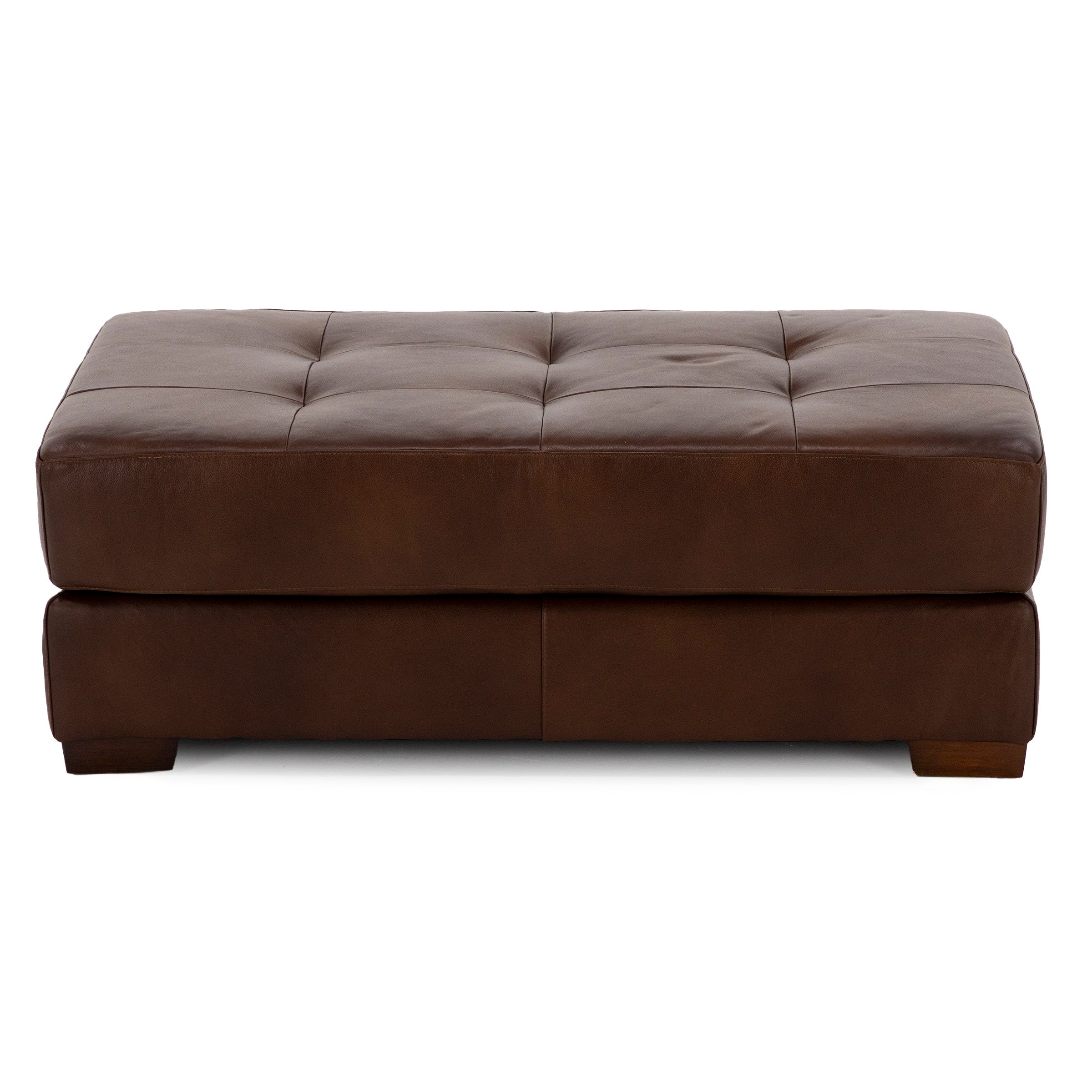 Brown leather ottoman with tufted top, shown from the front.