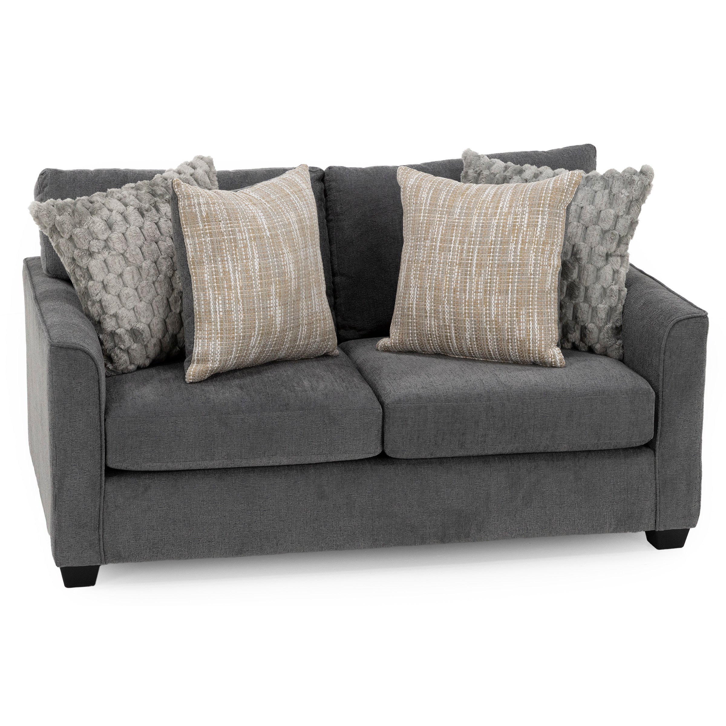 Gray upholstered sofa with four decorative pillows, two textured and two patterned.