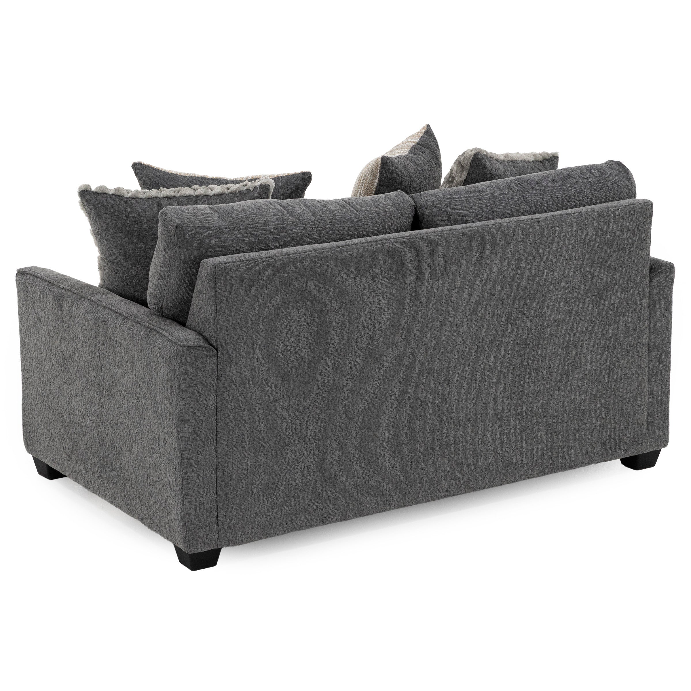 Back view of a modern gray sofa with plush cushions.