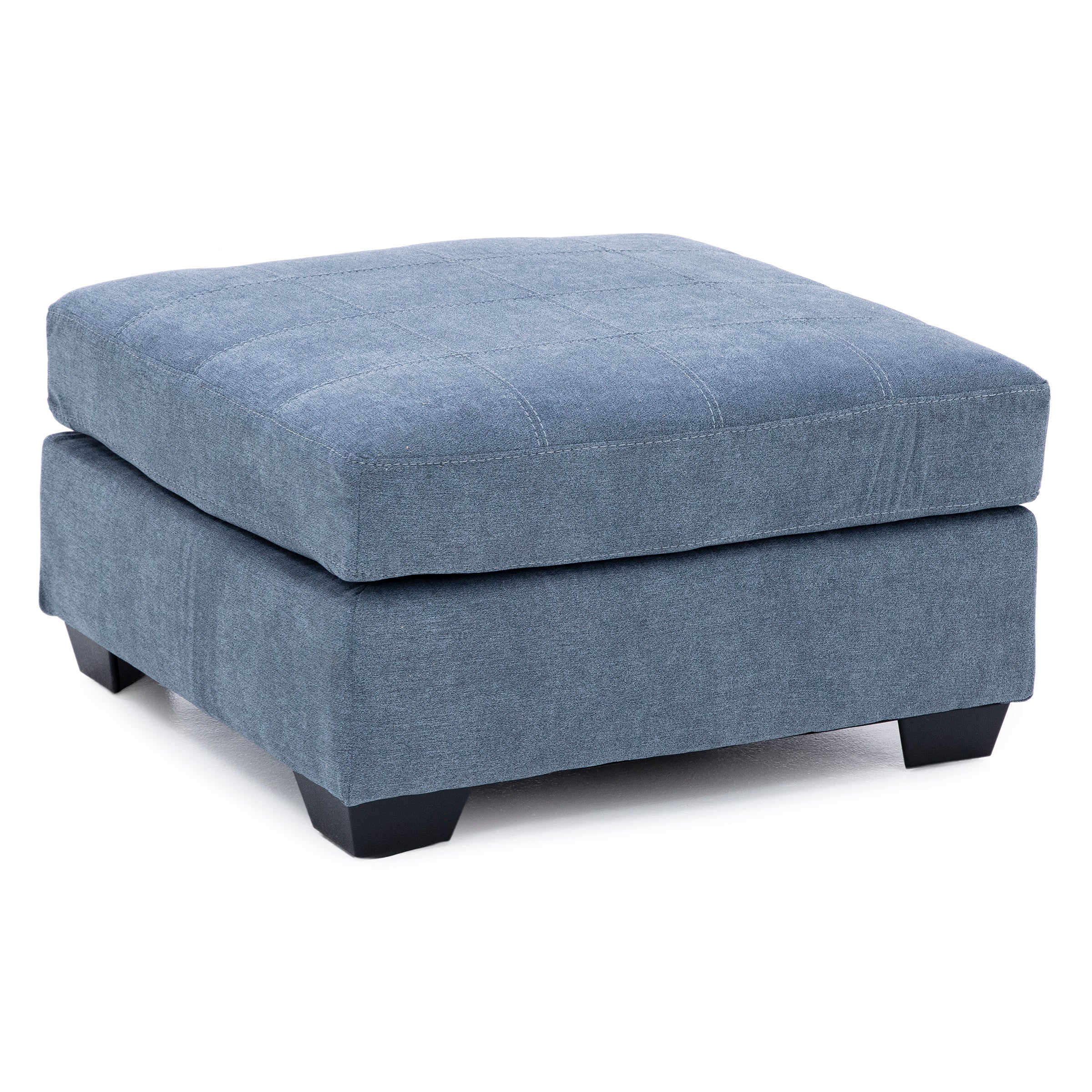 Square blue upholstered ottoman with short black legs.