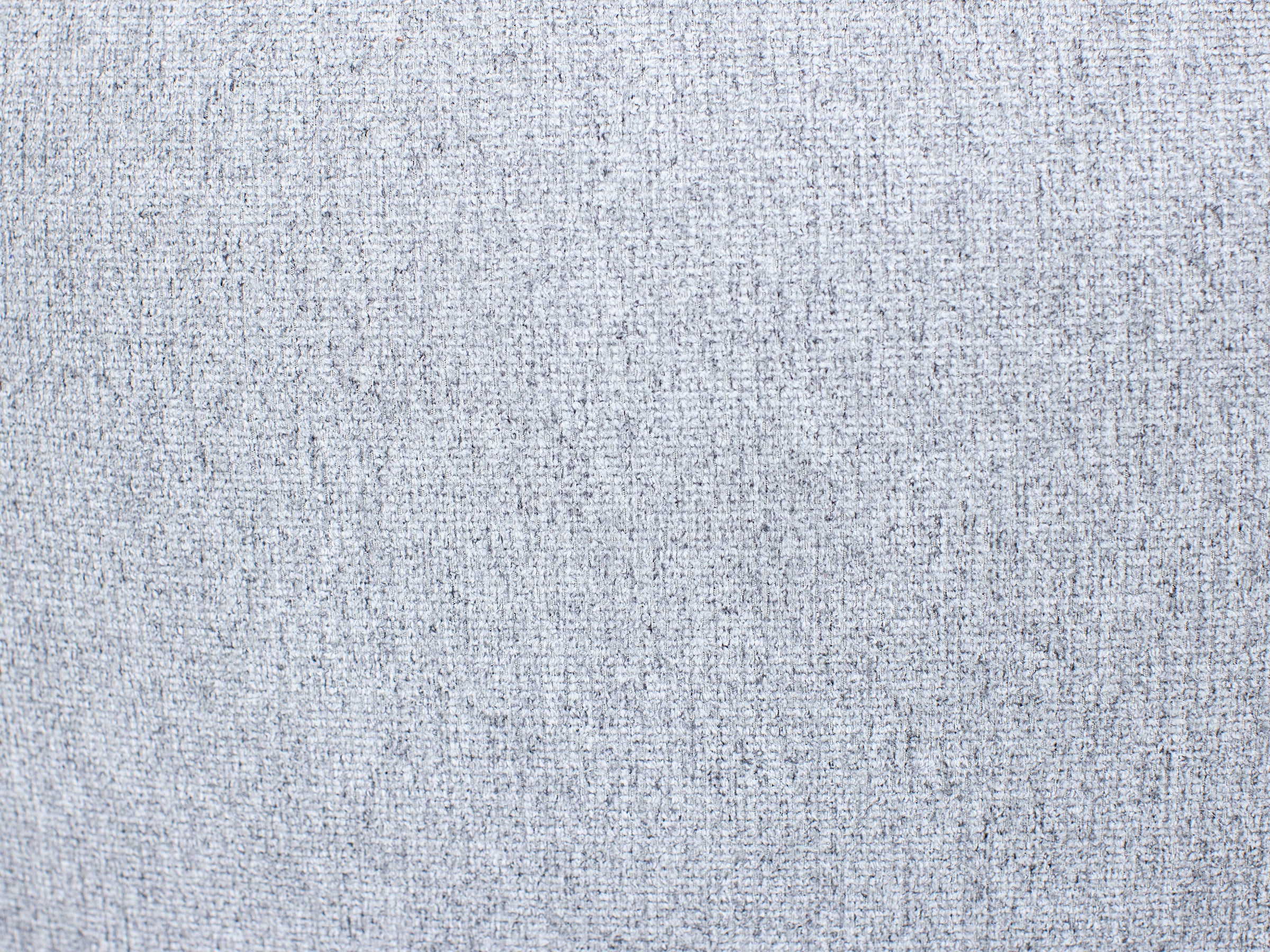 Light gray woven fabric texture background.