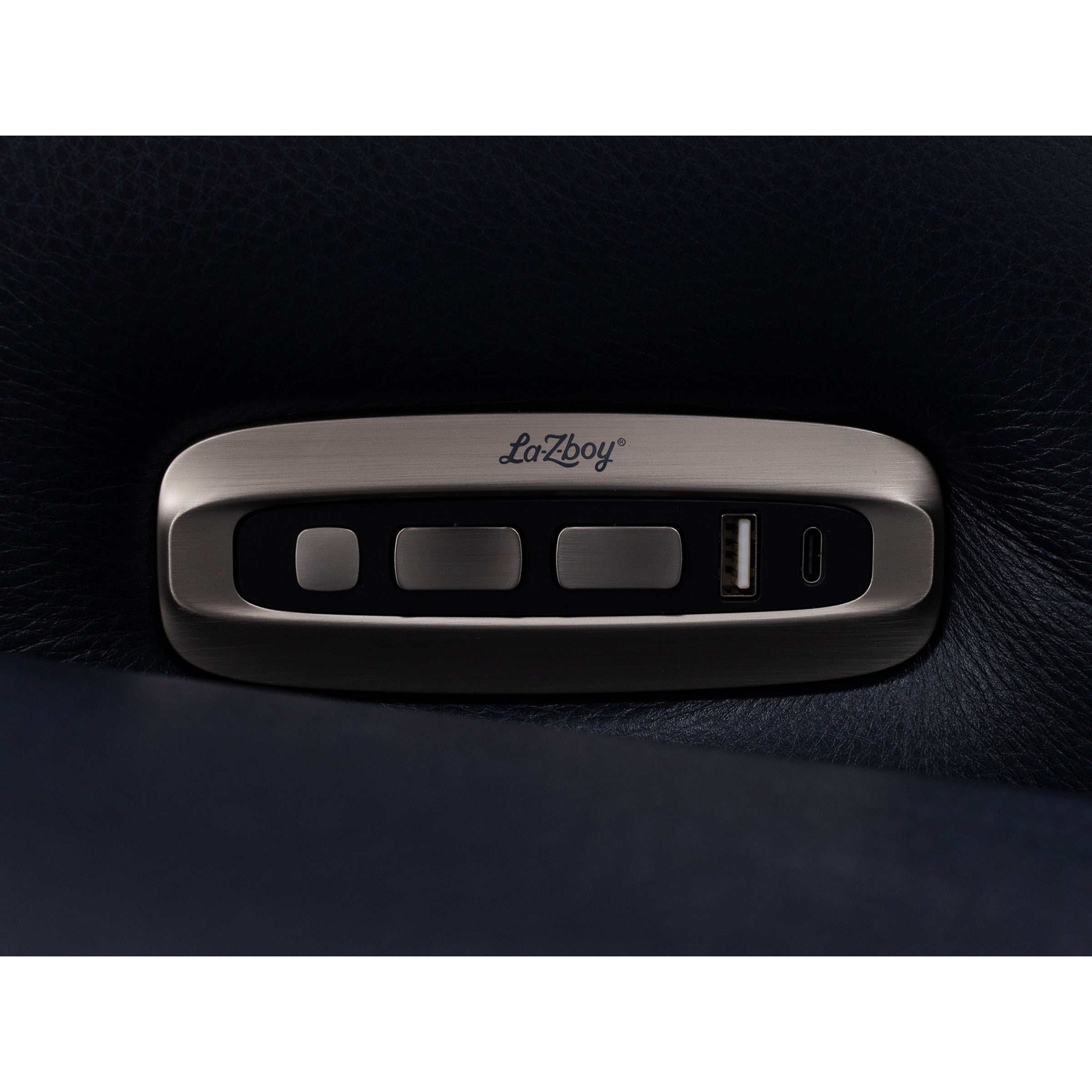 Close-up of La-Z-Boy recliner control panel with adjustment buttons and USB ports.