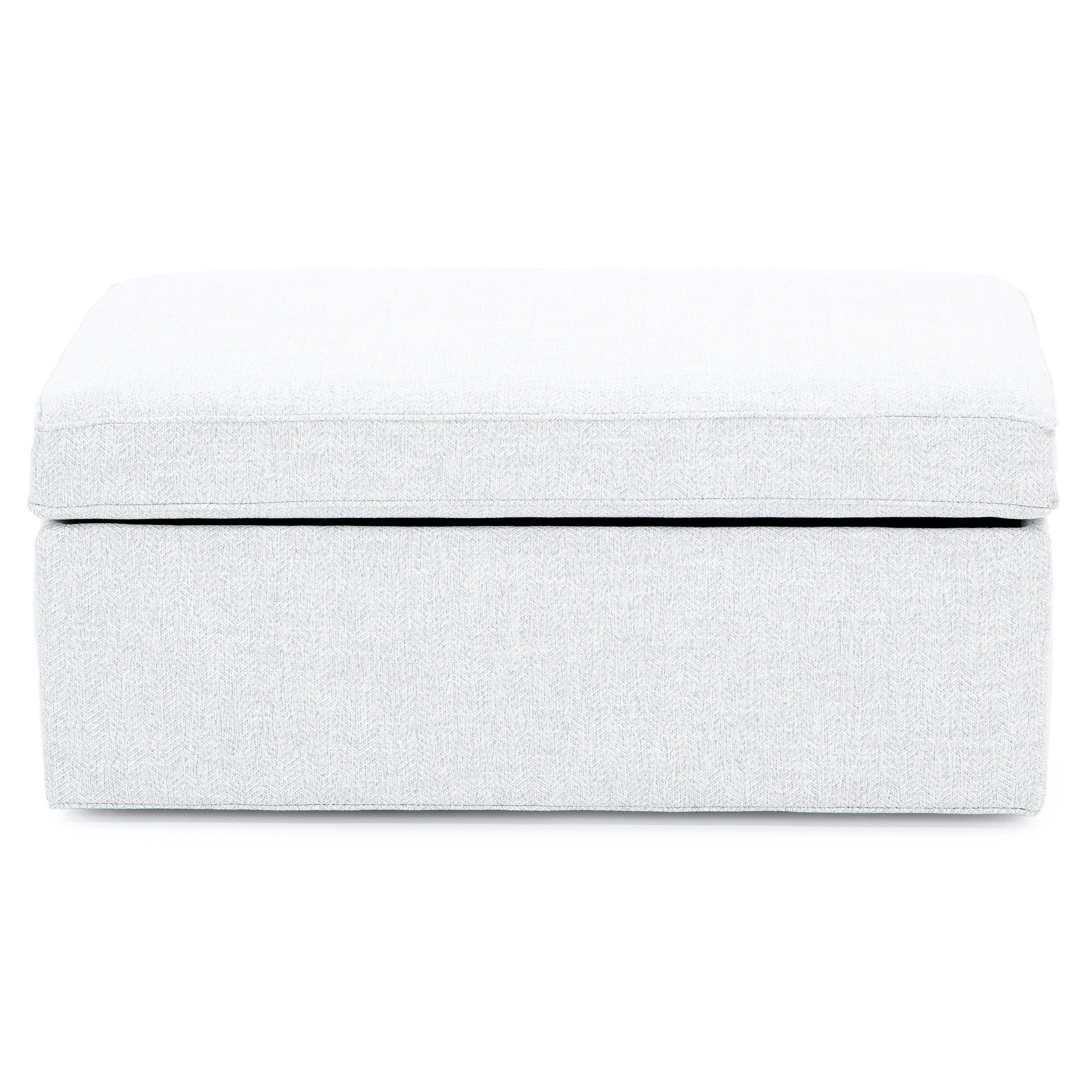 Light gray fabric ottoman with a square shape, shown from the front.