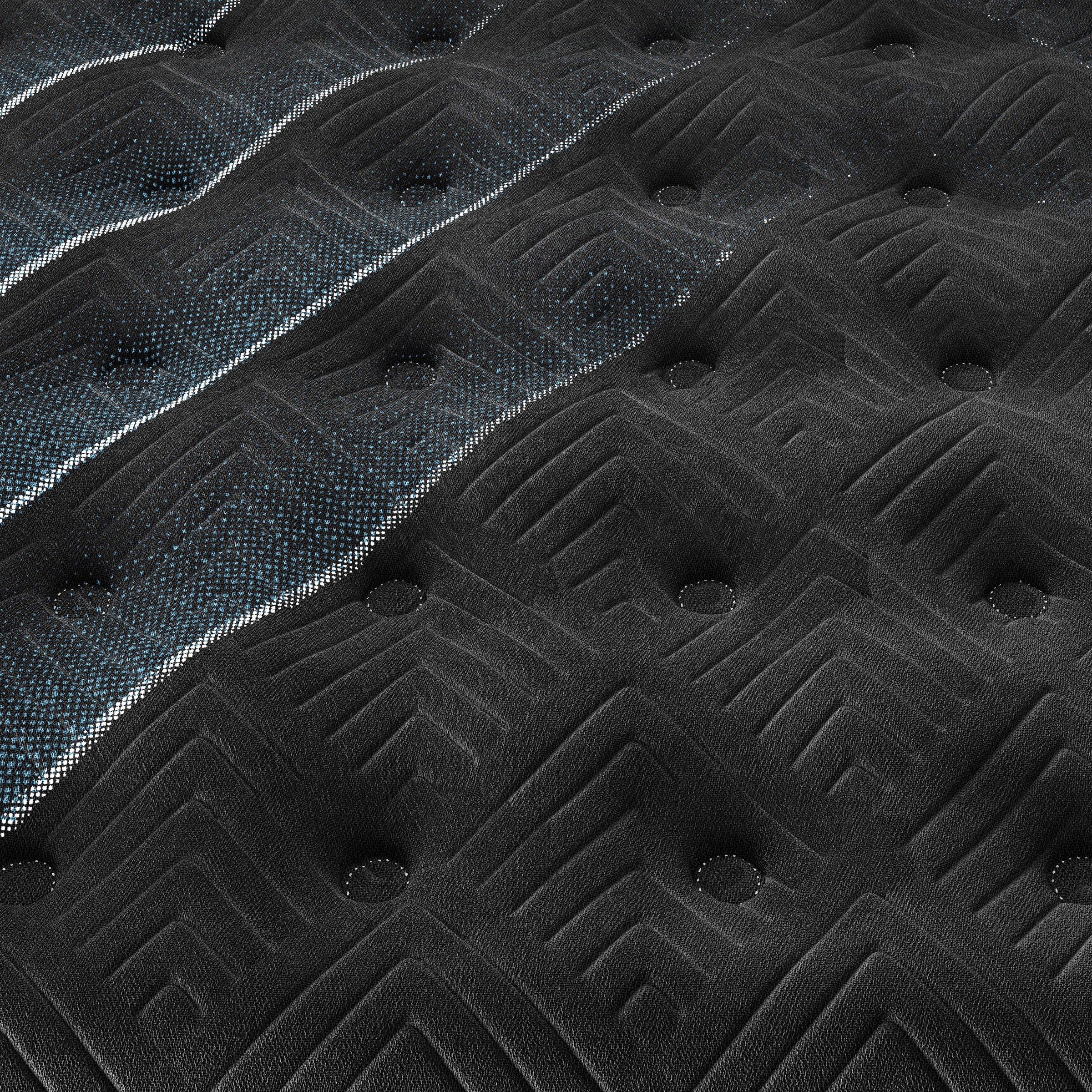Close-up of a black mattress surface with textured geometric patterns and tufted details.