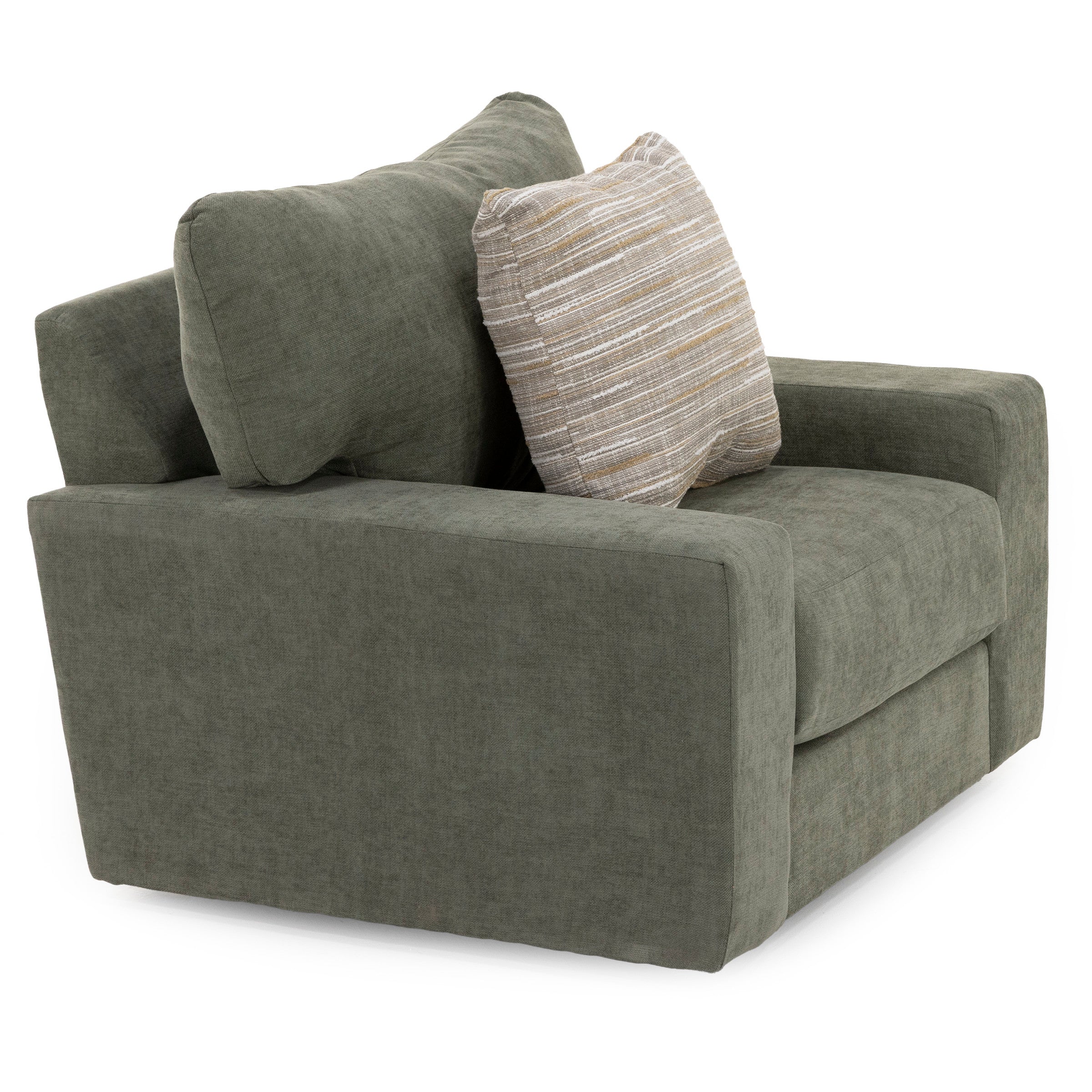 Oversized green armchair with a striped accent pillow.