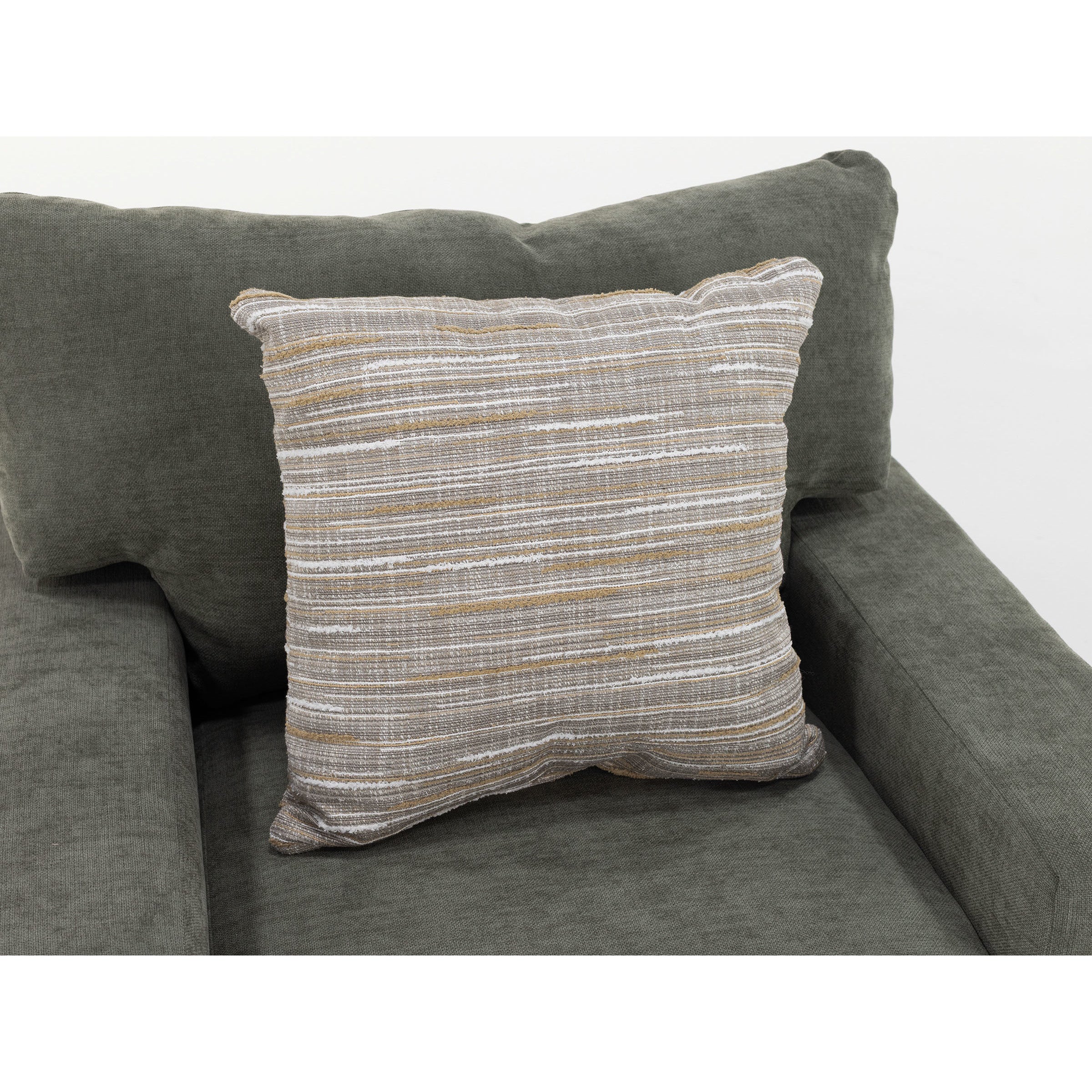 Striped accent pillow on a dark gray upholstered chair.