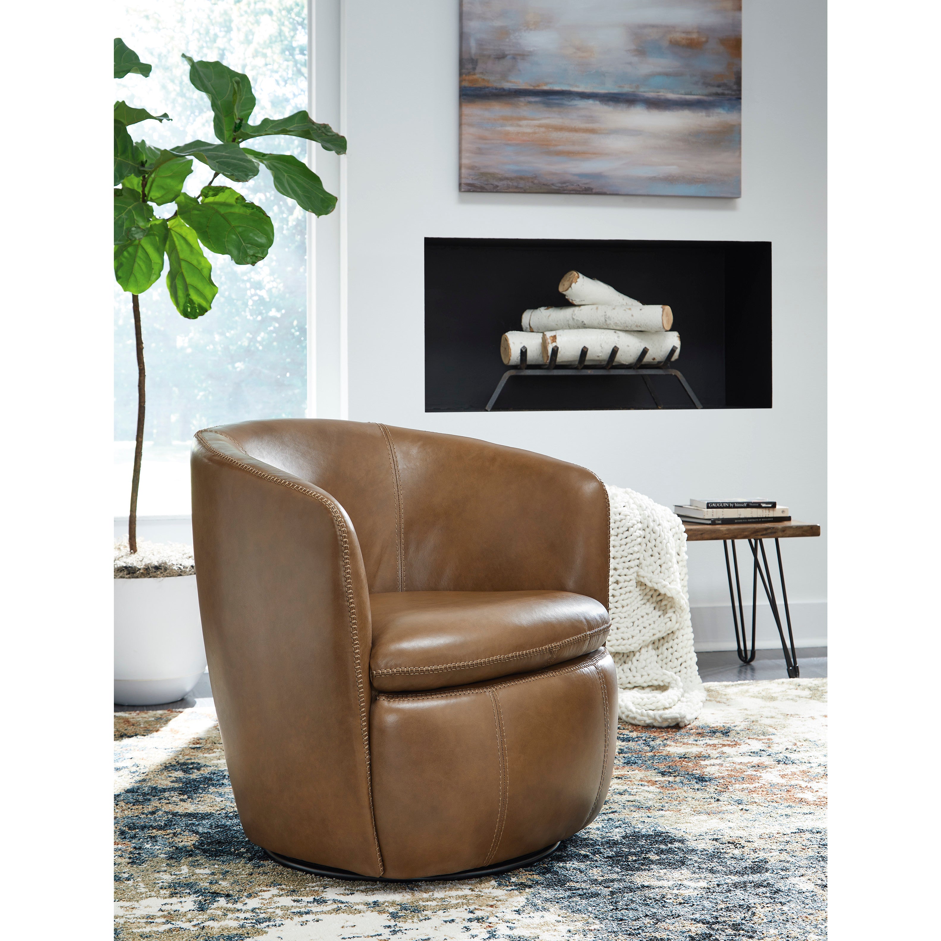 Brown leather swivel chair in a modern living room setting.