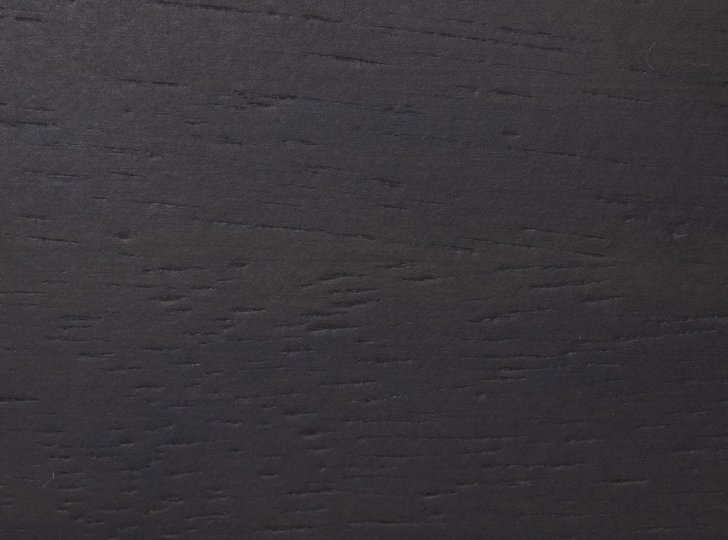 Dark wood texture with subtle grain pattern.